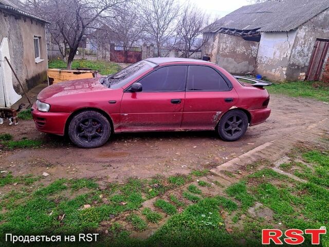 Красный Субару Импреза, объемом двигателя 1.6 л и пробегом 150 тыс. км за 2600 $, фото 4 на Automoto.ua