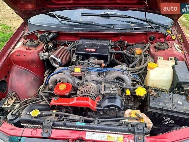 Красный Субару Импреза, объемом двигателя 1.6 л и пробегом 150 тыс. км за 2600 $, фото 2 на Automoto.ua