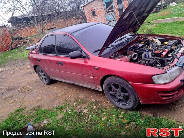 Красный Субару Импреза, объемом двигателя 1.6 л и пробегом 150 тыс. км за 2600 $, фото 2 на Automoto.ua