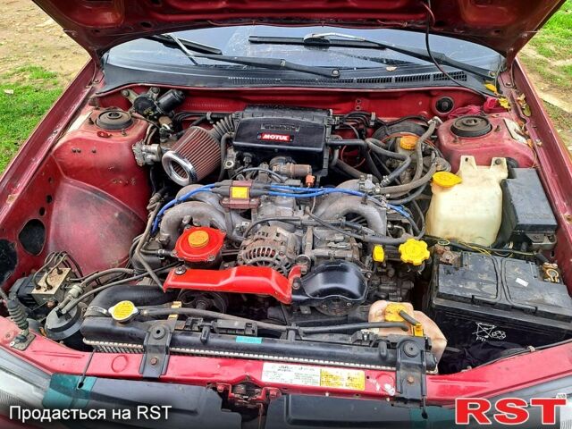 Красный Субару Импреза, объемом двигателя 1.6 л и пробегом 150 тыс. км за 2600 $, фото 3 на Automoto.ua