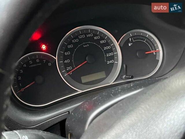 Субару Імпреза 2008 у Києві на Automoto.ua Червоний Субару Імпреза, об'ємом двигуна 2 л та пробігом 322 тис. км за 7490 $, фото 30 на Automoto.ua