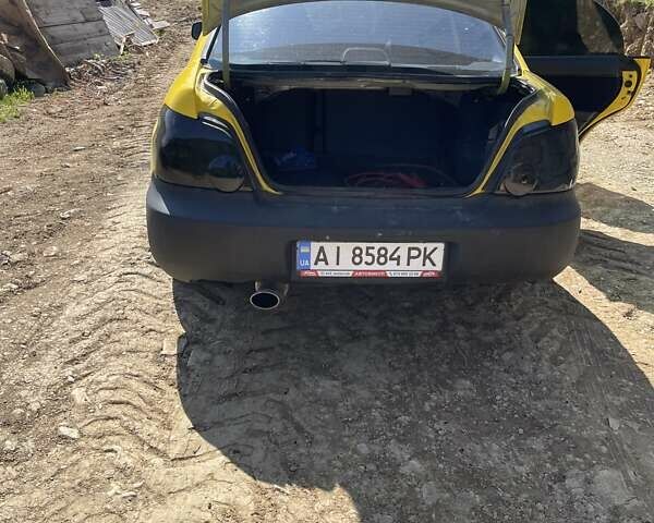 Желтый Субару Импреза, объемом двигателя 1.6 л и пробегом 200 тыс. км за 5000 $, фото 3 на Automoto.ua