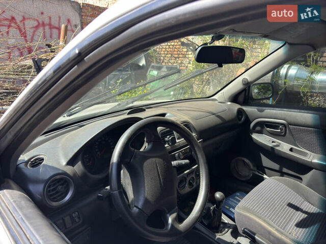 Серый Субару Импреза, объемом двигателя 1.6 л и пробегом 315 тыс. км за 2300 $, фото 7 на Automoto.ua