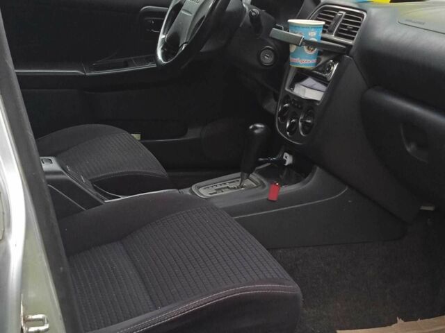 Серый Субару Импреза, объемом двигателя 1.6 л и пробегом 265 тыс. км за 3000 $, фото 5 на Automoto.ua