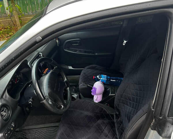 Серый Субару Импреза, объемом двигателя 1.6 л и пробегом 200 тыс. км за 6600 $, фото 9 на Automoto.ua