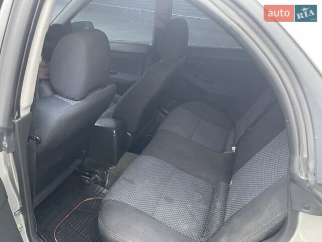 Серый Субару Импреза, объемом двигателя 1.6 л и пробегом 230 тыс. км за 4800 $, фото 12 на Automoto.ua