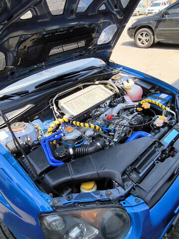 Синій Субару Імпреза, об'ємом двигуна 1.99 л та пробігом 235 тис. км за 7500 $, фото 4 на Automoto.ua