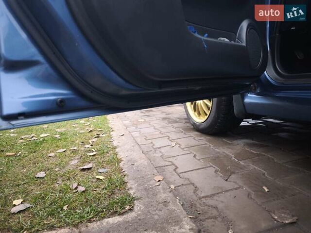 Синий Субару Импреза, объемом двигателя 1.99 л и пробегом 350 тыс. км за 4000 $, фото 16 на Automoto.ua