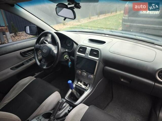 Синий Субару Импреза, объемом двигателя 1.99 л и пробегом 350 тыс. км за 4000 $, фото 7 на Automoto.ua