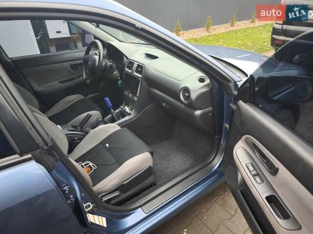 Синий Субару Импреза, объемом двигателя 1.99 л и пробегом 350 тыс. км за 4000 $, фото 6 на Automoto.ua