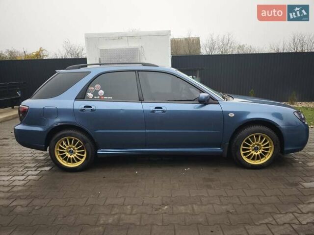 Синий Субару Импреза, объемом двигателя 1.99 л и пробегом 350 тыс. км за 4000 $, фото 2 на Automoto.ua