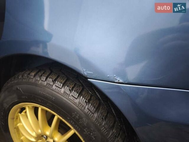 Синий Субару Импреза, объемом двигателя 1.99 л и пробегом 350 тыс. км за 4000 $, фото 11 на Automoto.ua