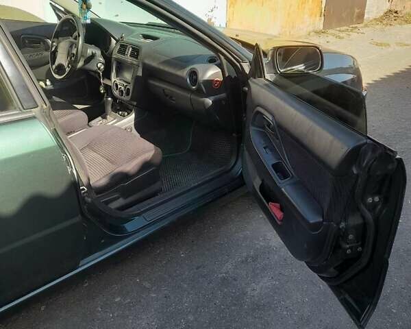 Зеленый Субару Импреза, объемом двигателя 1.6 л и пробегом 195 тыс. км за 3990 $, фото 3 на Automoto.ua