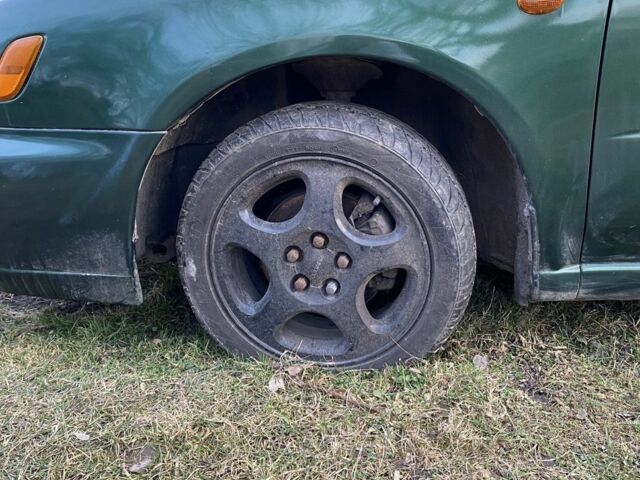 Зеленый Субару Импреза, объемом двигателя 1.6 л и пробегом 186 тыс. км за 2858 $, фото 4 на Automoto.ua