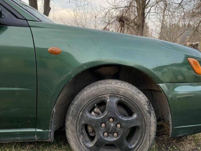 Зеленый Субару Импреза, объемом двигателя 1.6 л и пробегом 186 тыс. км за 2858 $, фото 5 на Automoto.ua