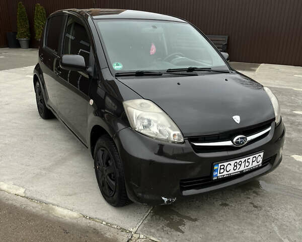 Черный Субару Джасти, объемом двигателя 1 л и пробегом 182 тыс. км за 3999 $, фото 1 на Automoto.ua