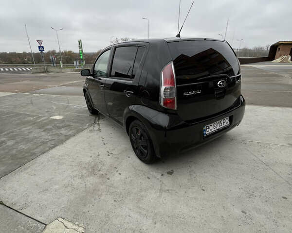 Черный Субару Джасти, объемом двигателя 1 л и пробегом 182 тыс. км за 3999 $, фото 5 на Automoto.ua