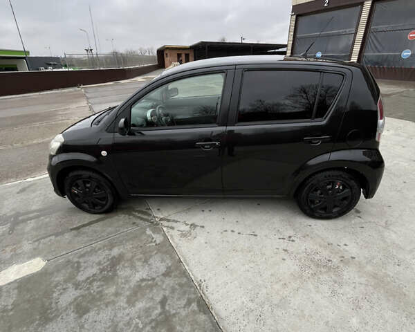 Черный Субару Джасти, объемом двигателя 1 л и пробегом 182 тыс. км за 3999 $, фото 6 на Automoto.ua