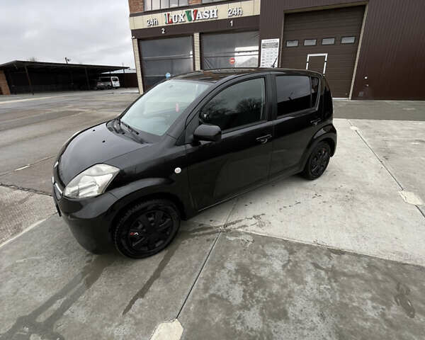 Черный Субару Джасти, объемом двигателя 1 л и пробегом 182 тыс. км за 3999 $, фото 7 на Automoto.ua