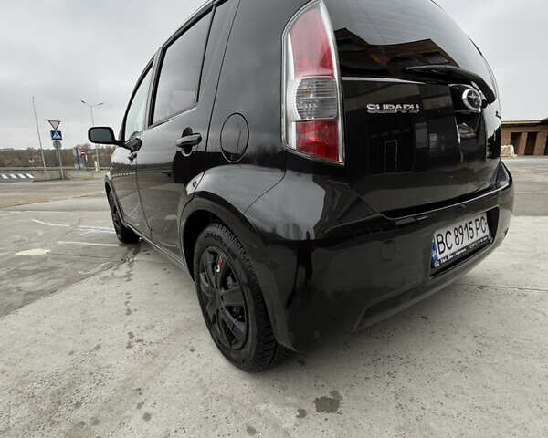 Черный Субару Джасти, объемом двигателя 1 л и пробегом 182 тыс. км за 3999 $, фото 9 на Automoto.ua