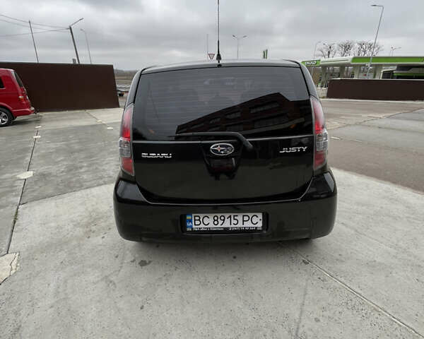 Черный Субару Джасти, объемом двигателя 1 л и пробегом 182 тыс. км за 3999 $, фото 4 на Automoto.ua