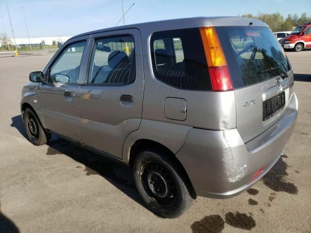 Сірий Субару Джасті, об'ємом двигуна 1.3 л та пробігом 65 тис. км за 2600 $, фото 5 на Automoto.ua