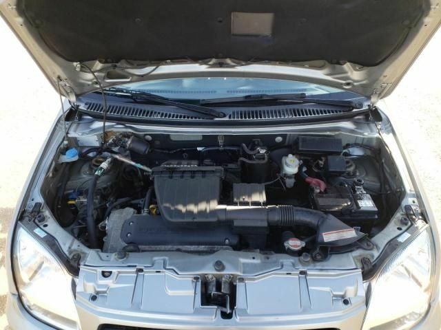 Сірий Субару Джасті, об'ємом двигуна 1.3 л та пробігом 65 тис. км за 2600 $, фото 4 на Automoto.ua