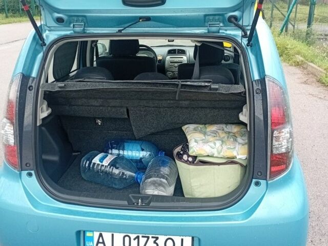 Синий Субару Джасти, объемом двигателя 1.3 л и пробегом 242 тыс. км за 4850 $, фото 4 на Automoto.ua
