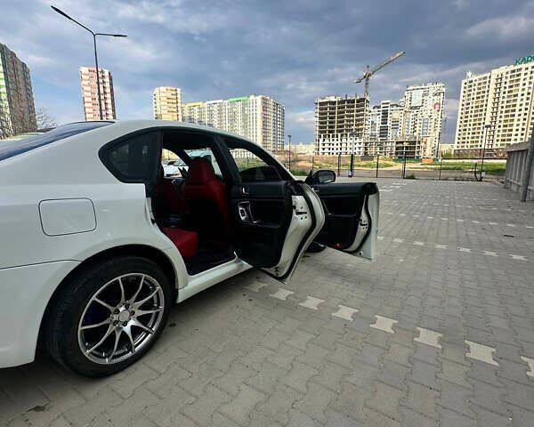 Білий Субару Легасі, об'ємом двигуна 2 л та пробігом 160 тис. км за 6000 $, фото 10 на Automoto.ua