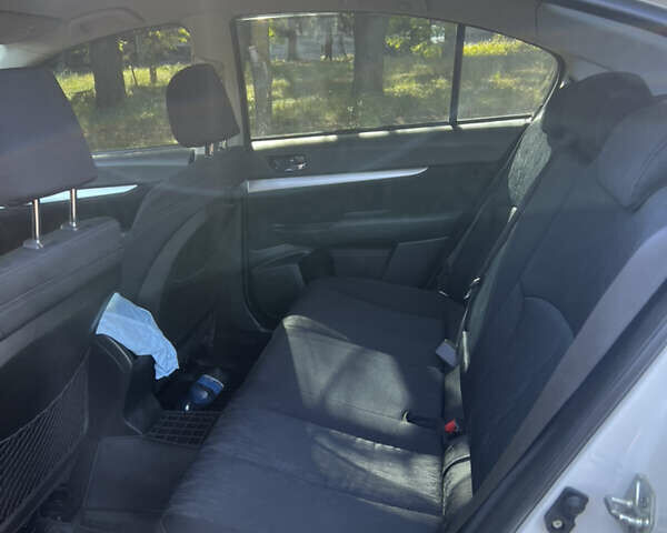 Білий Субару Легасі, об'ємом двигуна 1.99 л та пробігом 198 тис. км за 7050 $, фото 9 на Automoto.ua