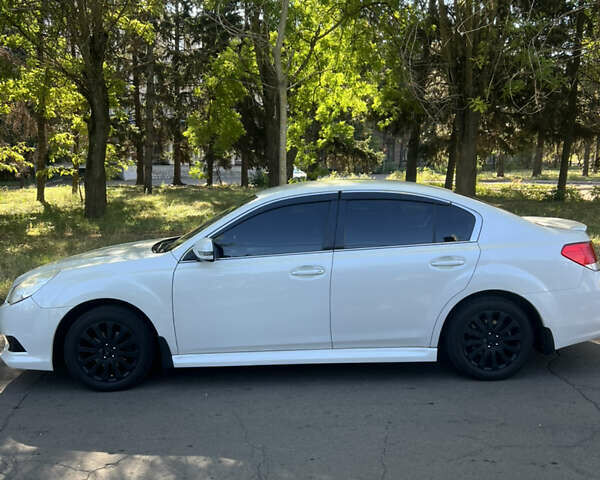 Білий Субару Легасі, об'ємом двигуна 1.99 л та пробігом 198 тис. км за 7050 $, фото 5 на Automoto.ua