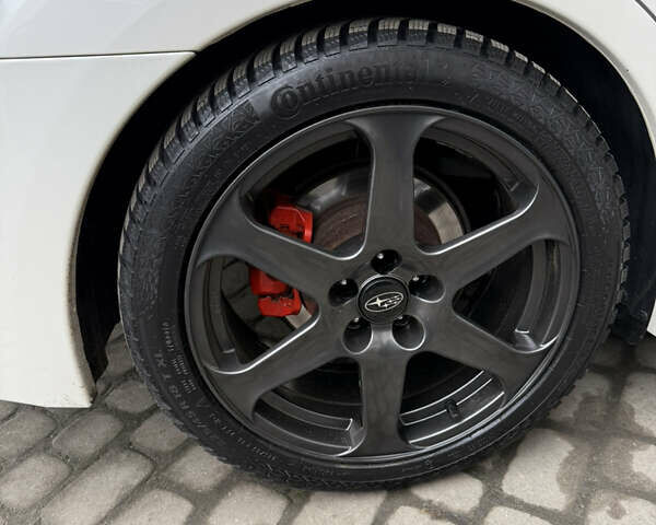 Белый Субару Легаси, объемом двигателя 2.46 л и пробегом 178 тыс. км за 10999 $, фото 7 на Automoto.ua