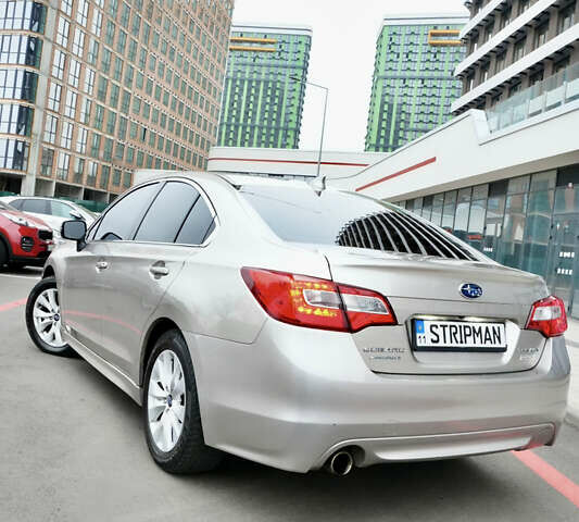 Бежевый Субару Легаси, объемом двигателя 2.46 л и пробегом 140 тыс. км за 12400 $, фото 4 на Automoto.ua