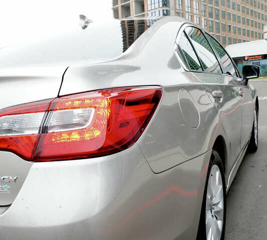 Бежевый Субару Легаси, объемом двигателя 2.46 л и пробегом 140 тыс. км за 12400 $, фото 3 на Automoto.ua