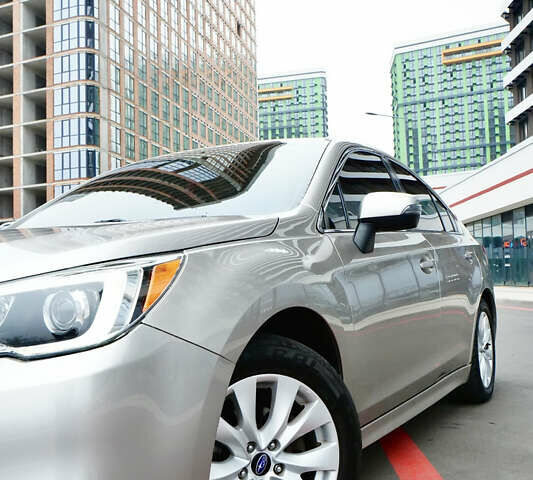 Бежевый Субару Легаси, объемом двигателя 2.46 л и пробегом 140 тыс. км за 12400 $, фото 1 на Automoto.ua