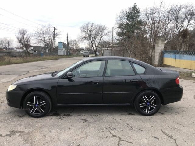 Черный Субару Легаси, объемом двигателя 2.5 л и пробегом 200 тыс. км за 3850 $, фото 5 на Automoto.ua