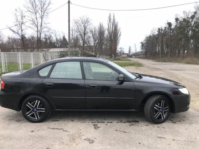 Черный Субару Легаси, объемом двигателя 2.5 л и пробегом 200 тыс. км за 3850 $, фото 2 на Automoto.ua