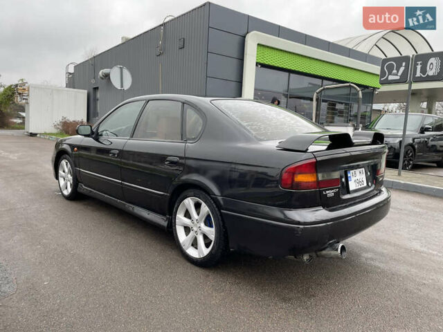 Черный Субару Легаси, объемом двигателя 2.46 л и пробегом 324 тыс. км за 4200 $, фото 6 на Automoto.ua