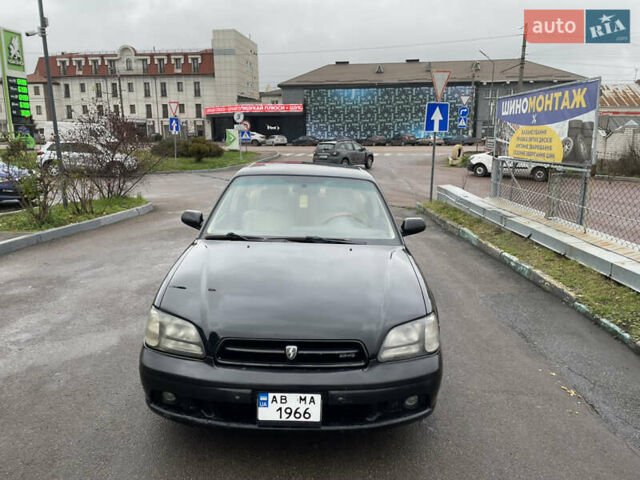 Черный Субару Легаси, объемом двигателя 2.46 л и пробегом 324 тыс. км за 4200 $, фото 1 на Automoto.ua