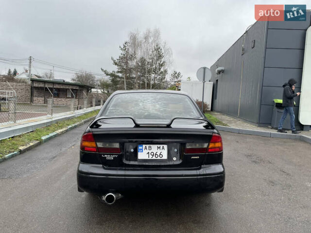 Черный Субару Легаси, объемом двигателя 2.46 л и пробегом 324 тыс. км за 4200 $, фото 4 на Automoto.ua