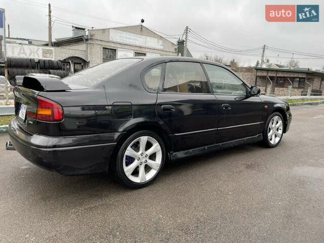 Черный Субару Легаси, объемом двигателя 2.46 л и пробегом 324 тыс. км за 4200 $, фото 3 на Automoto.ua