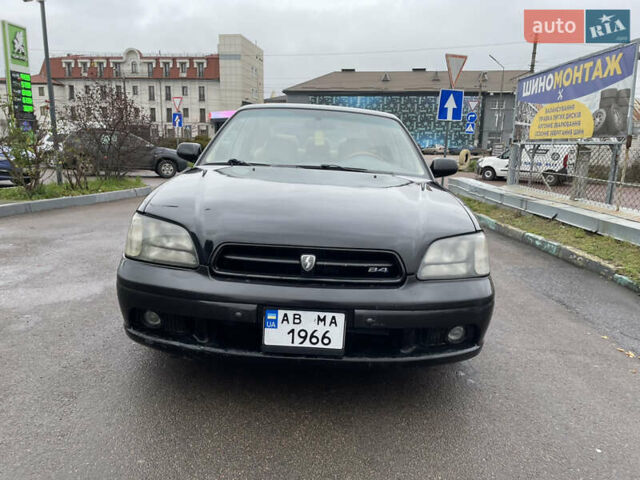 Черный Субару Легаси, объемом двигателя 2.46 л и пробегом 324 тыс. км за 4200 $, фото 2 на Automoto.ua