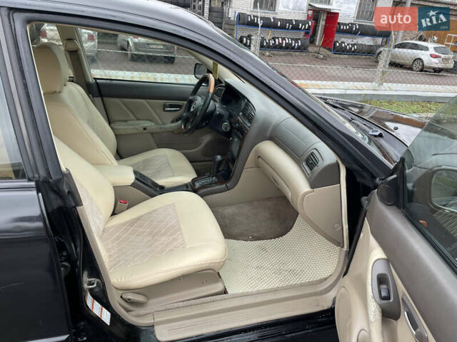 Черный Субару Легаси, объемом двигателя 2.46 л и пробегом 324 тыс. км за 4200 $, фото 10 на Automoto.ua