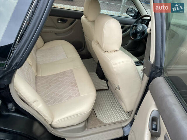 Черный Субару Легаси, объемом двигателя 2.46 л и пробегом 324 тыс. км за 4200 $, фото 11 на Automoto.ua