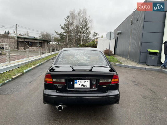 Черный Субару Легаси, объемом двигателя 2.46 л и пробегом 324 тыс. км за 4200 $, фото 5 на Automoto.ua