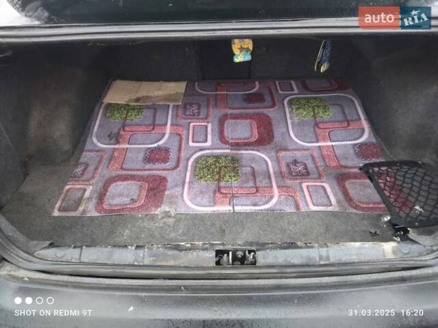 Чорний Субару Легасі, об'ємом двигуна 2 л та пробігом 292 тис. км за 2800 $, фото 19 на Automoto.ua
