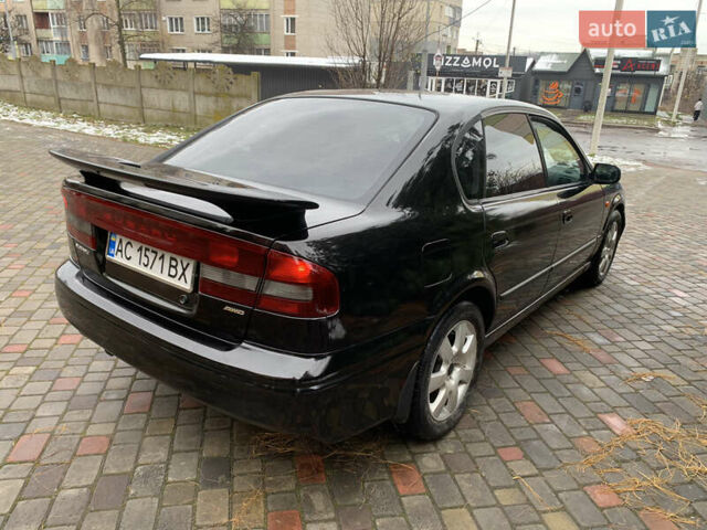 Чорний Субару Легасі, об'ємом двигуна 1.99 л та пробігом 315 тис. км за 2900 $, фото 4 на Automoto.ua