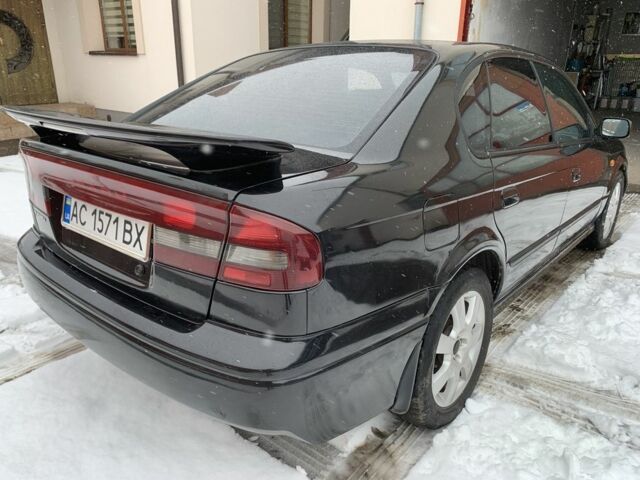 Черный Субару Легаси, объемом двигателя 2 л и пробегом 315 тыс. км за 2900 $, фото 5 на Automoto.ua