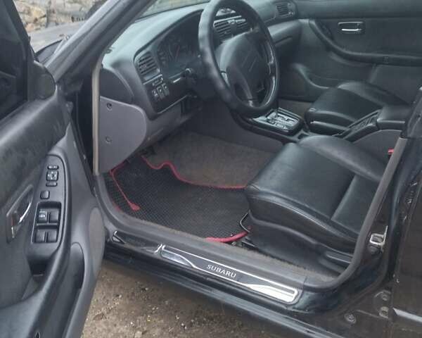 Чорний Субару Легасі, об'ємом двигуна 2 л та пробігом 292 тис. км за 2800 $, фото 10 на Automoto.ua