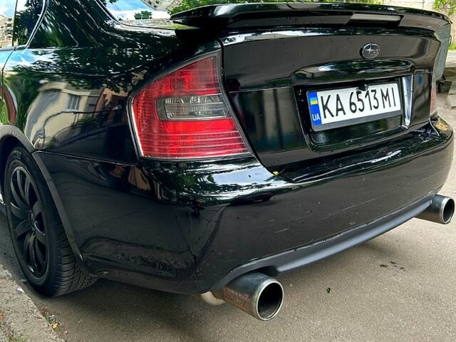 Черный Субару Легаси, объемом двигателя 2.5 л и пробегом 350 тыс. км за 3700 $, фото 1 на Automoto.ua